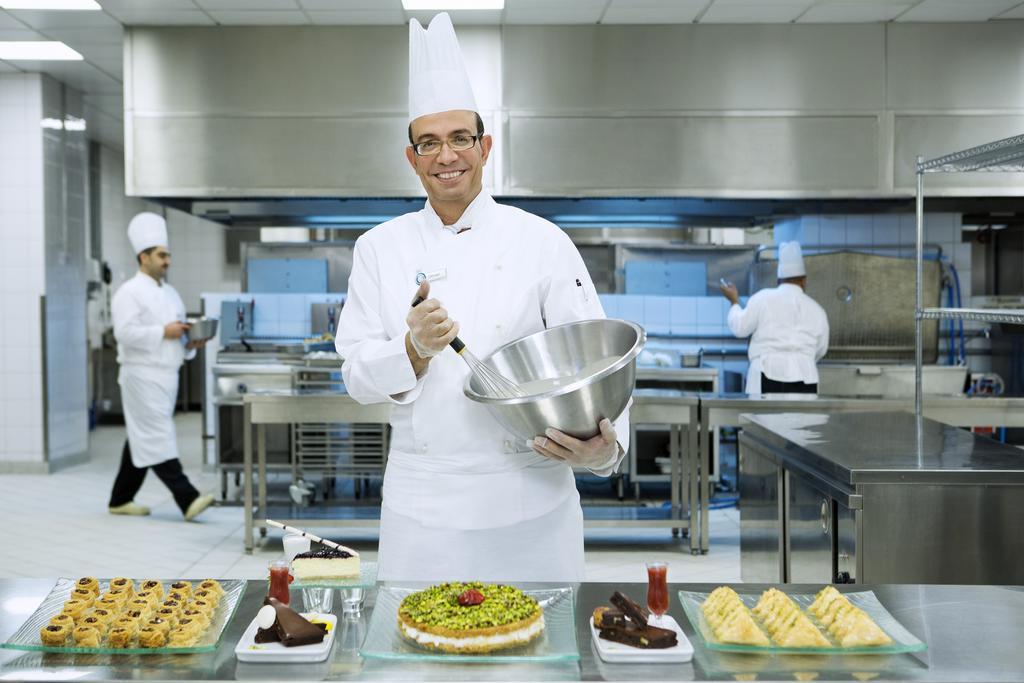 麦加安涅姆酒店 Mecca 外观 照片 Chef preparing desserts